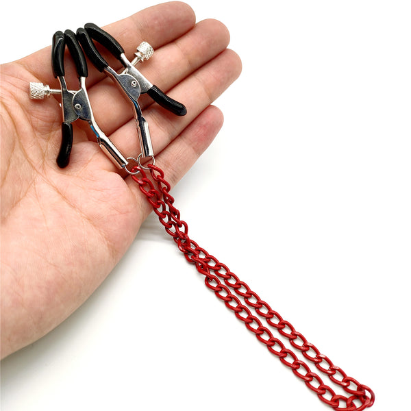 Pinces à tétons avec chaîne rouge