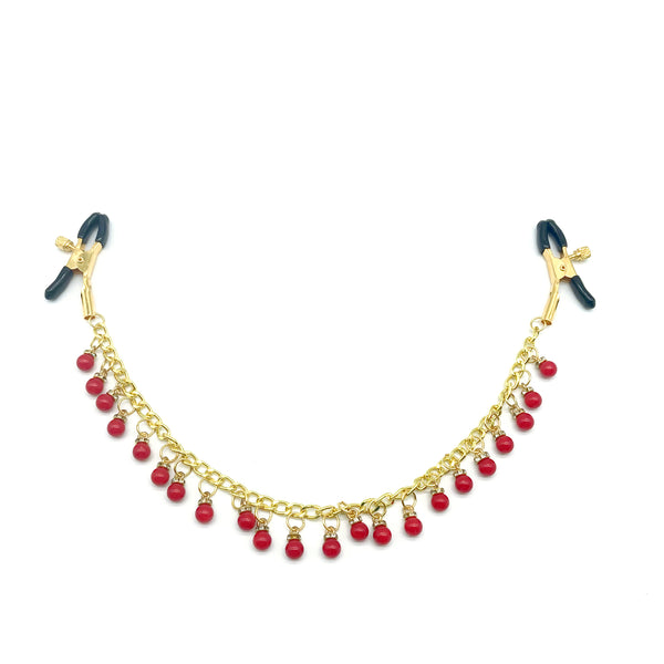 Pinces à tétons avec chaîne en or