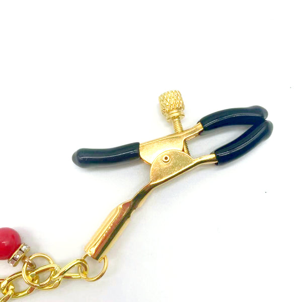 Pinces à tétons avec chaîne en or